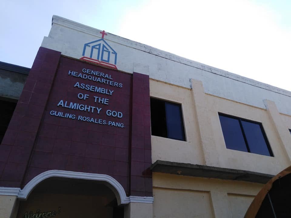 Congregation raising hands in worship